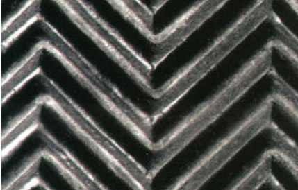 Embossed conveyor belts large herringbone